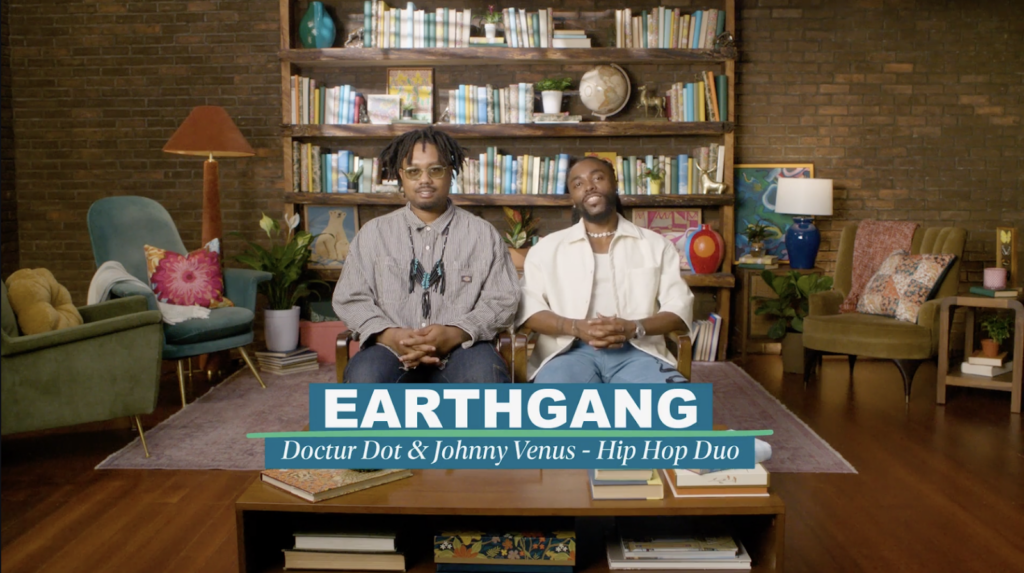 Screenshot of video of EarthGang, with text on screen reading "EARTHGANG, Doctur Dot & Johnny Venus - Hip Hop Duo" 